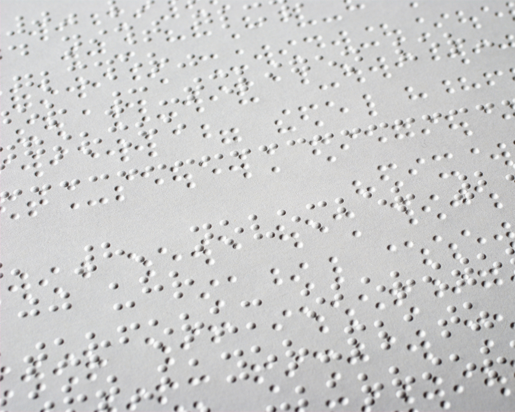 Página escrita em Braille idioma inglês